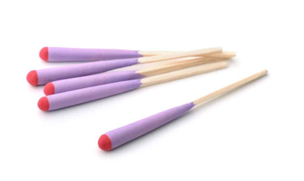 Loose stormproof matches with colored wax coating running the full length of the stick, not just the head